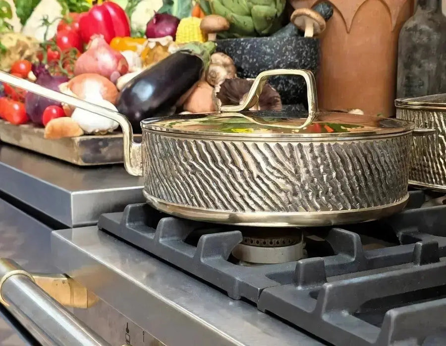 Robustus saute pan by Eaglador on a stovetop 