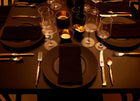 Bronze cutlery standard set in use with fine dining setup – Eaglador handcrafted Kansa utensils for sophisticated meals.