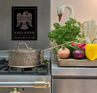 Luxury PFAS-free uncoated Kansa bronze saucepan on modern kitchen counter with vegetables and lifestyle setting