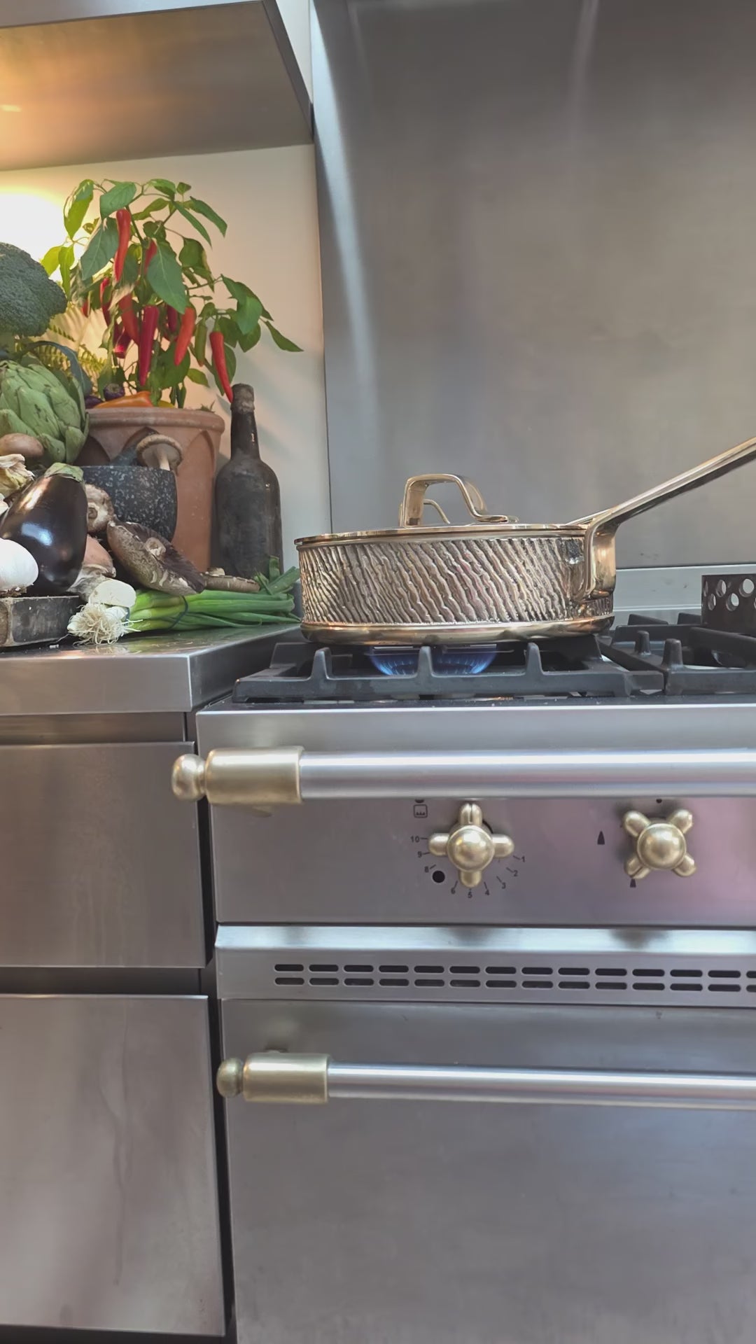 Whole chicken being cooked in Eaglador's uncoated Kansa Bronze sauté pan - PFAS-free cookware