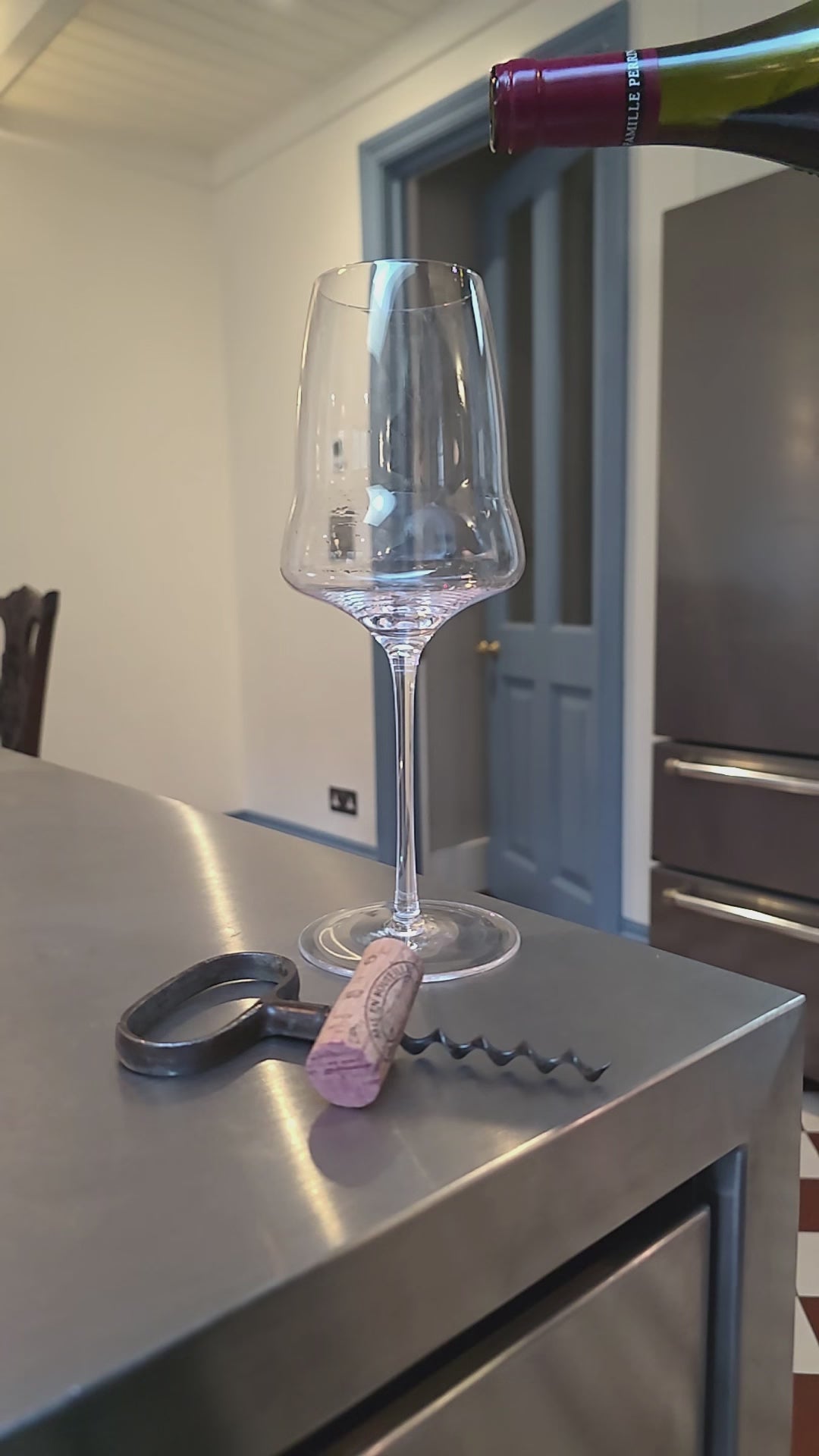Eaglador red wine glass being filled – thin rim and high clarity -luxury wine glasses