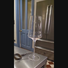 Eaglador white wine glass being filled with white wine – thin rim and high clarity -luxury wine glasses