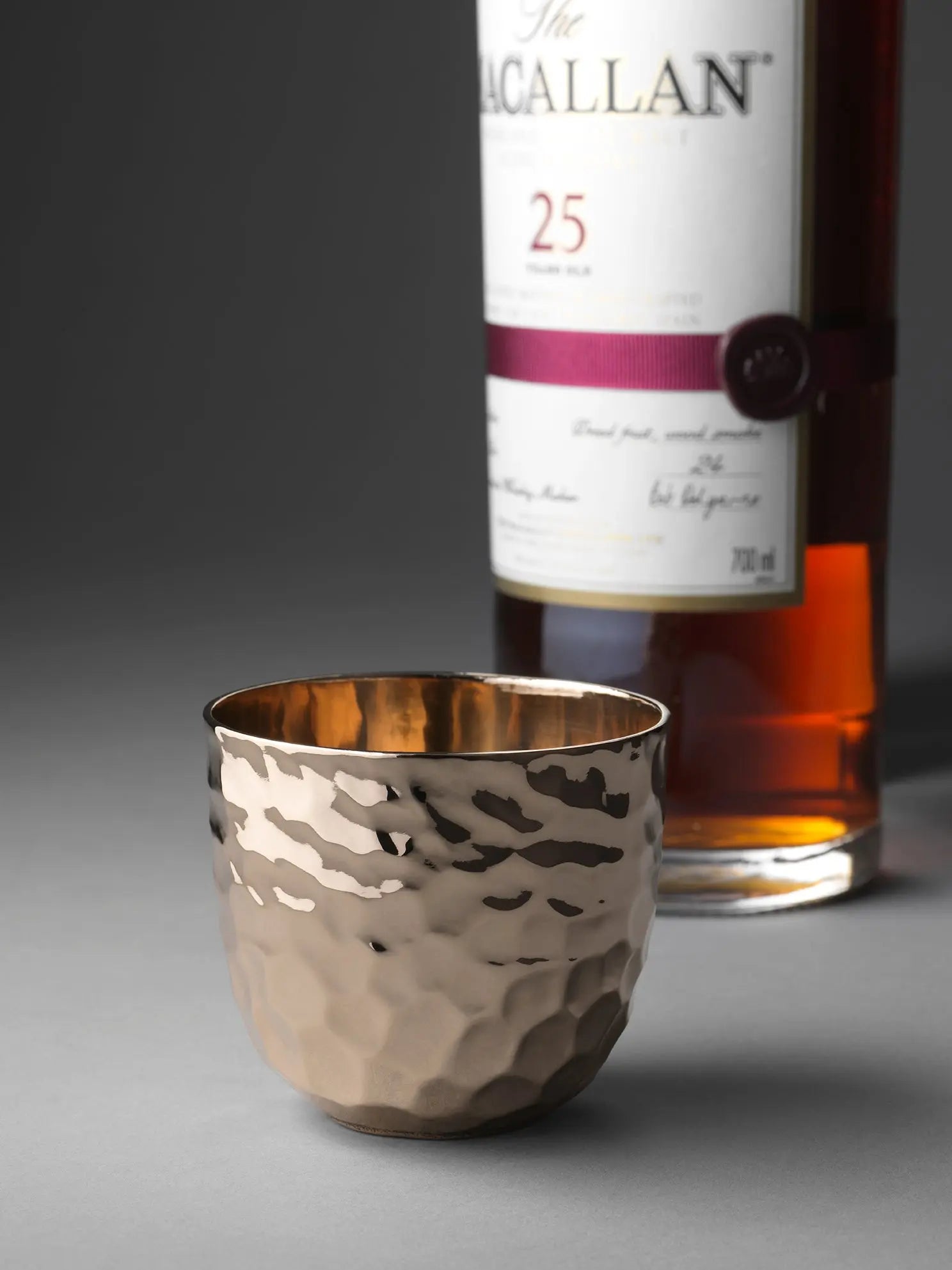 Eaglador bronze cup with Macallan